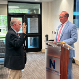 wootten being sworn in by Cooper