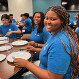 girls learning to use forks properly