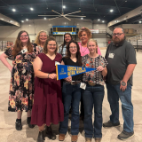 ag group holding banner