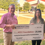 black scholarship check presentation