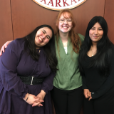 three girls at conference