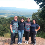 students with professor at overlook