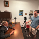 student interviewing Dr. Yox